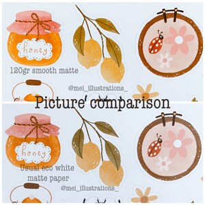 May include: A comparison of two sticker designs. One features a honey jar with the word "honey", a lemon branch, and a floral embroidery hoop with a ladybug. The other design is similar, with the text "120gr smooth matte" and "Usual eco white matte paper".