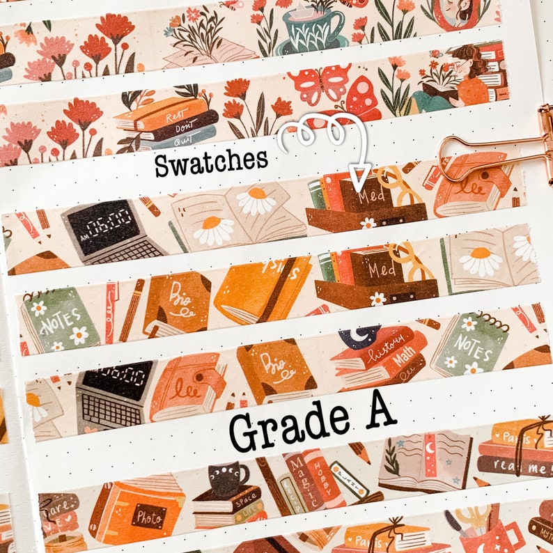 May include: A collection of decorative washi tape swatches featuring book-themed illustrations. The designs include stacks of books, daisies, laptops, and the text "Swatches" and "Grade A". The color palette includes beige, orange, and brown.