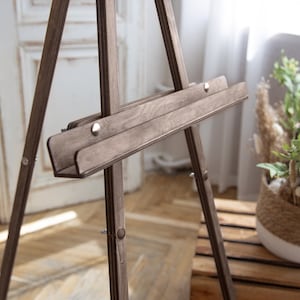 Brown small and large floor portable easel that folds. Easel for wedding signs and any rustic decor. Easel as a gift for an artist from WeddingByEli.