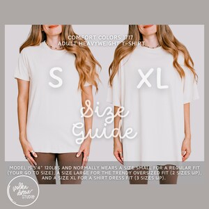 May include: Size guide for Comfort Colors 1717 adult heavyweight t-shirts. The image shows two models wearing the t-shirts in sizes S and XL. The text on the image provides sizing information, including the model's height and weight, and how the shirts fit.