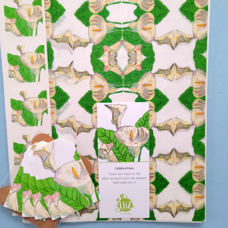 The Calla Lilies Tissue Paper kit has five large sheets of my own calla lilies design. The kit also comes with matching stickers, gift tags, a small spool of twine and a haiku bookmark greeting tag. Shown above: all the components of the kit shown against a blue background.