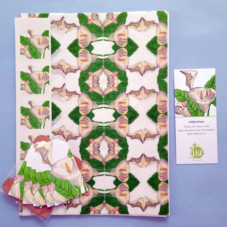 The kit contains five large sheets of paper, five matching gift tags and stickers, a small spool of twine and a haiku poem greeting tag and bookmark. Packaged in a cellophane sleeve. Shown above against a blue background.