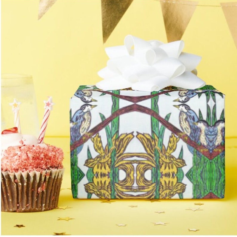 The tissue paper is 17 inches by 23 inches. With five sheets, there is enough to wrap several small jewelry sized boxes or a couple of medium and larger sized boxes. Shown above: a medium sized square gift box wrapped in the paper and topped with a white bow, placed next to a cupcake. (bow and cupcake not included).