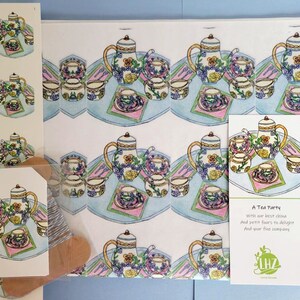 May include: A set of tea party wrapping paper, gift tags, and a card. The wrapping paper features a repeating pattern of teacups, teapots, and floral designs in shades of pink, blue, green, and yellow. The gift tags and card are white with a similar design and the text "A Tea Party with our best china And petit fours to delight And your fine company LHZ".