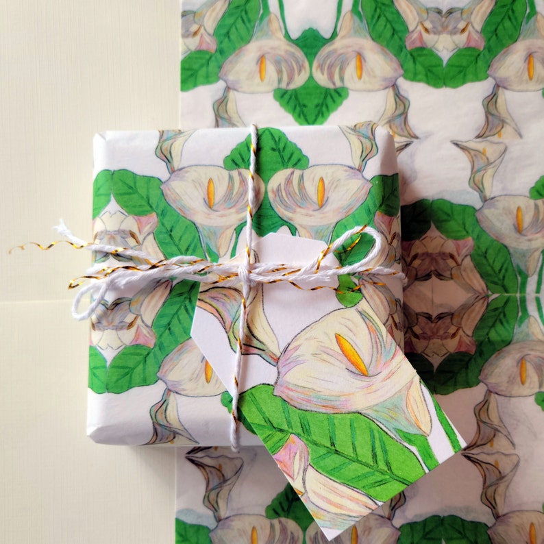 With five large sheets, you can wrap many small sized jewelry boxes or several medium or large sized gift boxes. Shown above: a small square box wrapped in the paper.