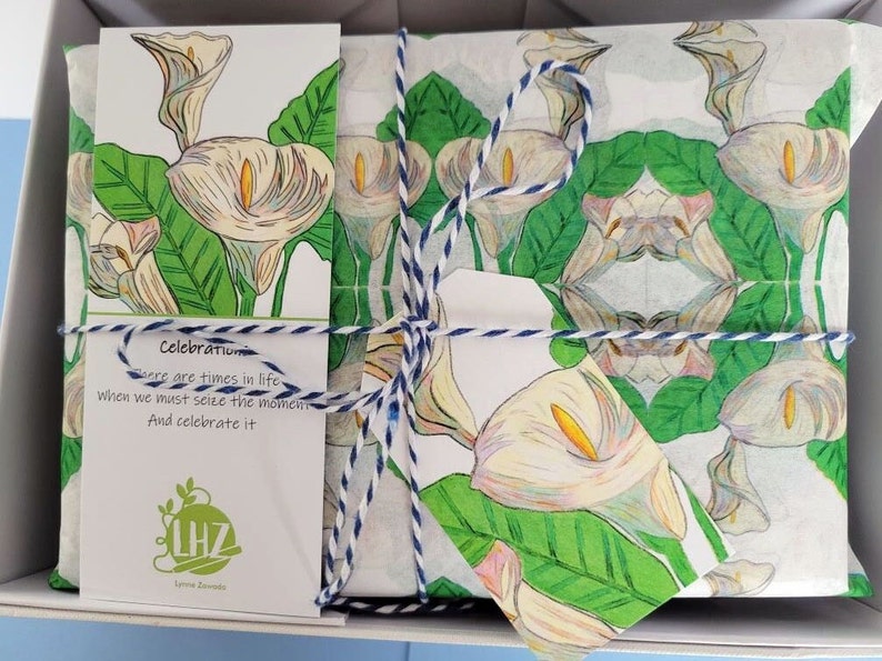 The paper makes a lovely gift wrap and gift box liner. Shown above: a medium sized gift is wrapped in the paper and placed inside a gift box.