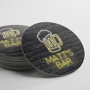 May include: A black and white brick background with a yellow neon beer mug and the text "Matt's Bar" in yellow neon.