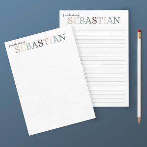 May include: Two white lined notepads with the text "from the deck of SEBASTIAN" at the top. The name is in colorful letters.