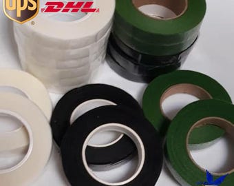 May include: Assortment of floral tapes in white, black, and green. The image shows several rolls of tape, including white double-sided tape and green floral tape. The UPS, FedEx, and DHL logos are visible in the upper left corner.