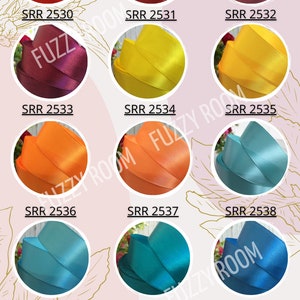 May include: Palette of 12 satin ribbon colors, including red, yellow, orange, blue, purple, and teal. Each ribbon is labeled with a color code, such as "SRR 2530" and "SRR 2544".