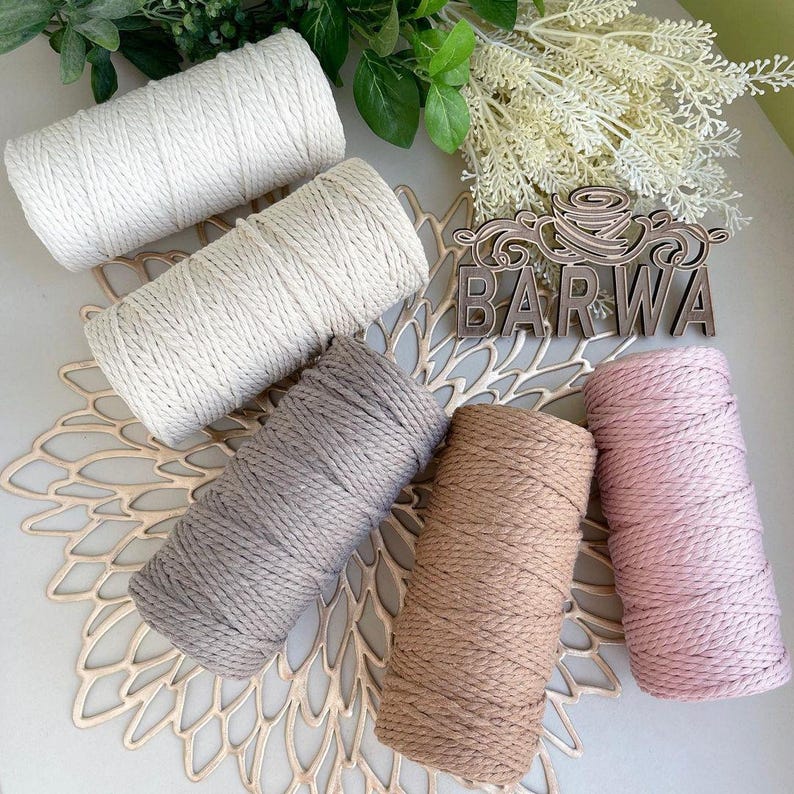 Close-up of premium 4mm cotton macrame cord in neutral beige and white, high quality natural yarn for macrame projects