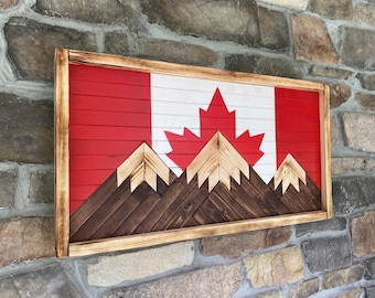 Mountain scape with Canadian Flag backdrop