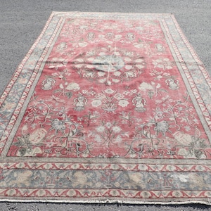 Vintage Turkish Rug, 6x11ft, Rich Red Floral Design, Intricate Patterns, Elegant Home Decor