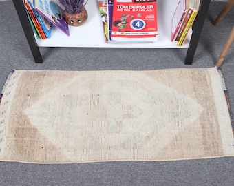 Alfombra turca vintage de 1,4 x 3,1 pies, alfombra de lana ikat marrón.