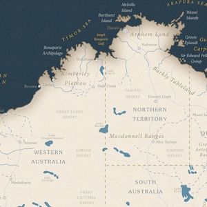 May include: A map of Australia with state borders and major geographical features labeled. The map is on a cream background with blue lines and text. The map is surrounded by a dark blue border.