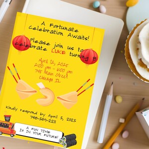 May include: A yellow invitation card with a Chinese New Year theme. The card has red lanterns, fortune cookies, chopsticks, and a food truck. The text on the card reads "A Fortunate Celebration Awaits! Please join us to celebrate LUKE turning 8. April 12, 2025 2:00 pm - 6:00 pm 745 Main Street Chicago IL Kindly respond by April 5, 2025 748-569-2211 A FUN TIME IS IN YOUR FUTURE!"
