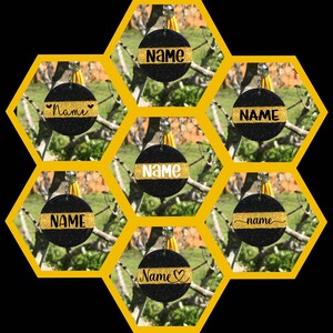 May include: Six black and gold glitter round keychains with the word "NAME" written in black on each keychain. The keychains are arranged in a honeycomb pattern.