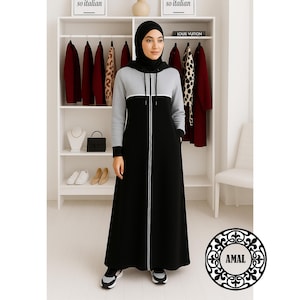jersey dress with hood Black jersey hooded dress with a metal visible corset belt