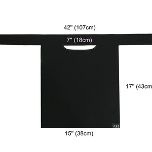 May include: Black fabric apron with a 42-inch wide neck opening and a 17-inch drop. The apron is 15 inches wide and has a 7-inch wide neck opening.