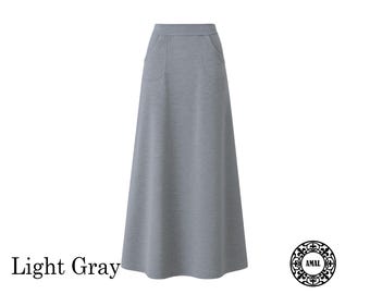 AMAL MUSLIM. Print a Long Maxi Knitted Skirt With a Wide Belt. USA. Model 106.