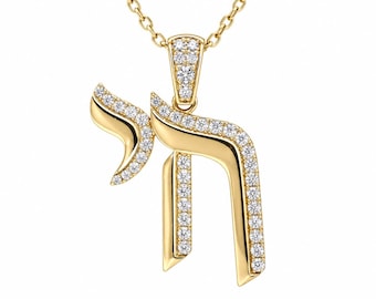 May include: A gold pendant shaped as the Hebrew letter Chai, featuring a polished yellow gold finish and inlaid with small, clear, round-cut white stones along the edges. The pendant hangs from a matching gold chain attached to a stone-set bail.