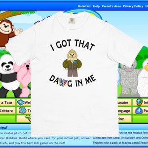Könnte beinhalten: Weißes T-Shirt mit einem Cartoon-Hund, der eine braune Jacke trägt und den Text "I got that dawg in me".
