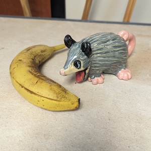 Figur aus der Serie Opossum