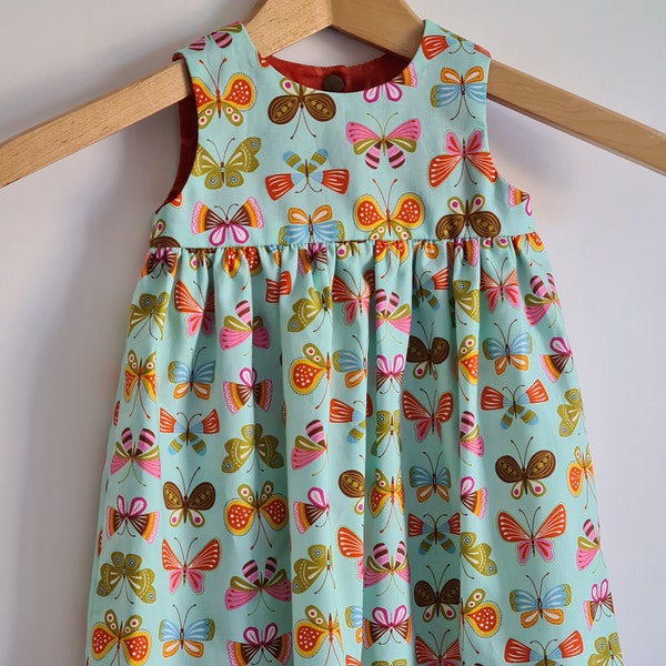 Ava dress in colourful butterflies,  handmade children's dress, sizes available 0-3 months to 12-18 months.