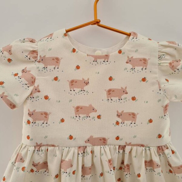 Pigs and apples on cream from Dashwood Farm Days Collection, handmade children's dress 3-6 months last one, special price, available now