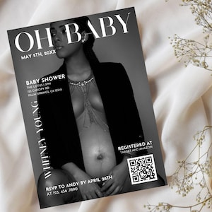 May include: Black and white baby shower invitation with a photo of a pregnant woman wearing a black jacket and a chain necklace. The invitation includes the text "OH BABY", "MAY 5TH, 20XX", "BABY SHOWER", "THE LOTUS (1PM)", "103 CANOPY RD", "PALM SPRINGS, CA 12345", "WHITNEY YOUNG", "RSVP TO ANDY BY APRIL 28TH", "AT 123. 456 7890", "REGISTERED AT", "TARGET AND AMAZON", and a QR code.