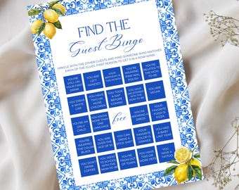May include: A blue and white "Find the Guest Bingo" game card with a lemon theme. The card features a decorative border and text boxes with prompts for guests to find others who match the clues. The words "Find the Guest Bingo" are at the top.