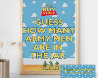 May include: A framed print with a blue sky background and white clouds. The text reads "GUESS HOW MANY ARMY MEN ARE IN THE JAR." Includes green toy army men at the bottom. A smaller card with the same design is also present.