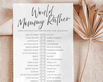 May include: A white card with the text "Would Mommy Rather" in a handwritten font. Below, a list of choices like "Stay at Home" and "Go Out" is presented for a baby shower game. The card is decorated with heart icons.