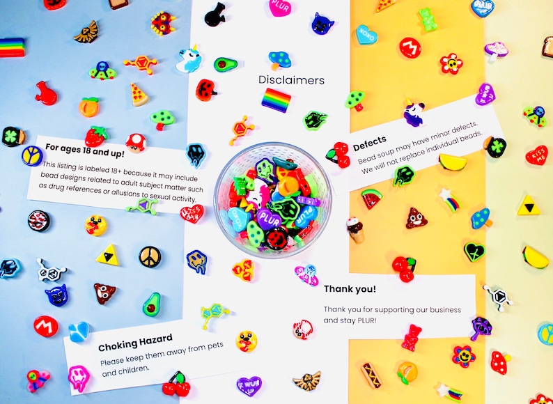 May include: A collection of colorful plastic beads in various shapes and designs, including hearts, flowers, and emojis, scattered on a white, blue, and yellow background. A clear bowl contains more beads. Text on the image includes warnings and disclaimers.