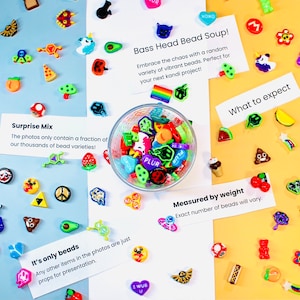 May include: A colorful assortment of novelty beads scattered on a multi-colored background. The image includes a glass bowl filled with beads, and text that reads "Bass Head Bead Soup!" and "Surprise Mix". Various shapes and colors are visible.