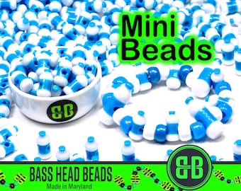 May include: A bowl filled with small blue and white plastic beads shaped like water bottles. The beads are labeled "Mini Beads".