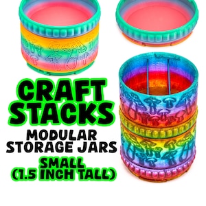 May include: Modular craft storage jars in a rainbow color scheme with mushroom designs. The jars are small, measuring 1.5 inches tall. The image includes the text "Craft Stacks, Modular Storage Jars, Small (1.5 inch tall)".
