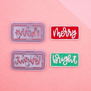 May include: Four rectangular Christmas-themed stickers with white lettering on a pink background. The stickers read "merry", "bright", "merry", and "twinkle".
