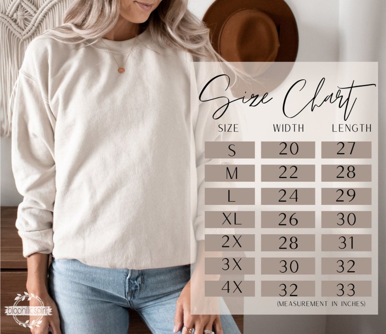 Puede incluir: Tabla de tallas para una sudadera con medidas en pulgadas. La tabla muestra el ancho y la longitud de la sudadera en las tallas S, M, L, XL, 2X, 3X y 4X.