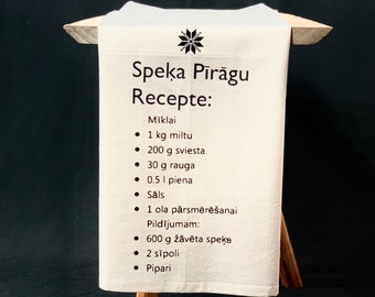 Flour sack kitchen towels with printed recipe of Latvian traditional Bacon Pastry " Speķa pīrāgi "