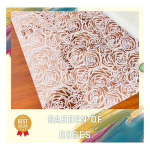 May include: A decorative sheet featuring a repeating pattern of white roses on a copper-colored background. The words "GARDEN OF ROSES" are displayed in white block letters. A "BEST SELLER" badge is in the lower left corner.