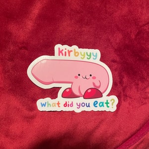 May include: Pink cartoon character with red shoes and the text "kirbyyy what did you eat?"