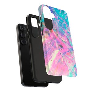 May include: A black smartphone with a triple-lens camera is shown next to a black phone case and a detached case cover. The cover features a vibrant, abstract design with swirls of pink, blue, and white.