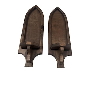 Dark walnut gothic wall sconces with candle shelf and routed channel detail