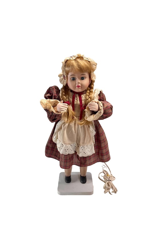 動く手と頭を持つ機械式オートマトン人形。ヴィンテージカントリー