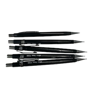 May include: A collection of five black mechanical pencils with silver accents. Each pencil has a pointed tip and a pocket clip. The pencils are labeled with "0.5mm Pentel P205".