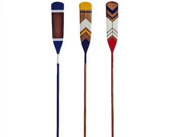 Wooden paddles and oars in three variations