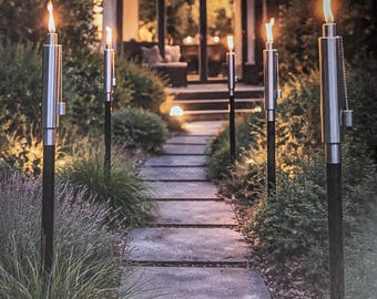 Antorcha de jardín, antorcha de aceite, acero inoxidable mate, disponible en dos versiones.