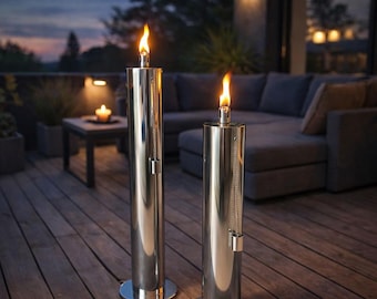 Lámpara de aceite de columna de acero inoxidable, disponible en dos tamaños.