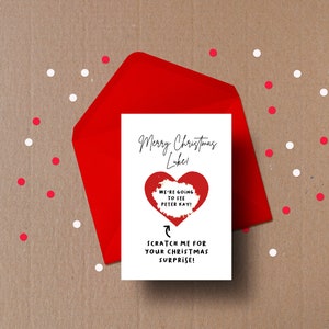 The card reads 'Merry Christmas' followed by your chosen name.
Below is a Heart that can be scratched off to reveal a secret message underneath.
Below that is an arrow pointing to the heart reading 'scratch me'